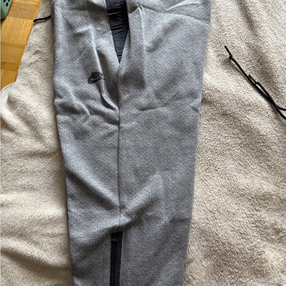Nike Women's Black and Gray Tech Pack Capris